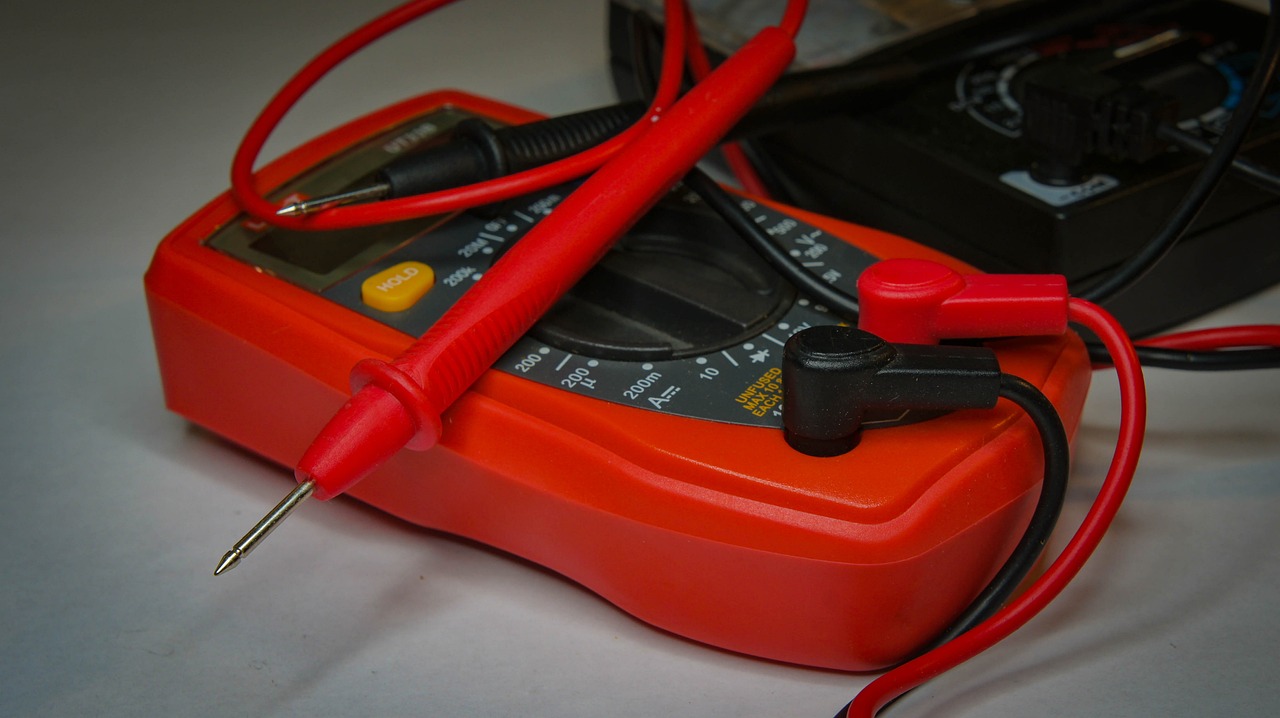 Electrician working on circuit breakers